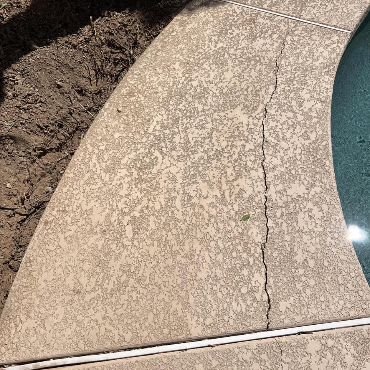 Pool deck repair and refinishing